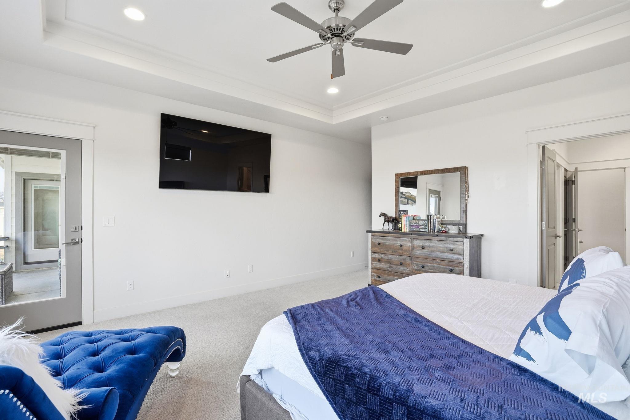 2301 Nordic Avenue Middleton, ID 83644 - Photo 18 of 50 Carpeted bedroom featuring recessed lighting, a ceiling fan, and a raised ceiling