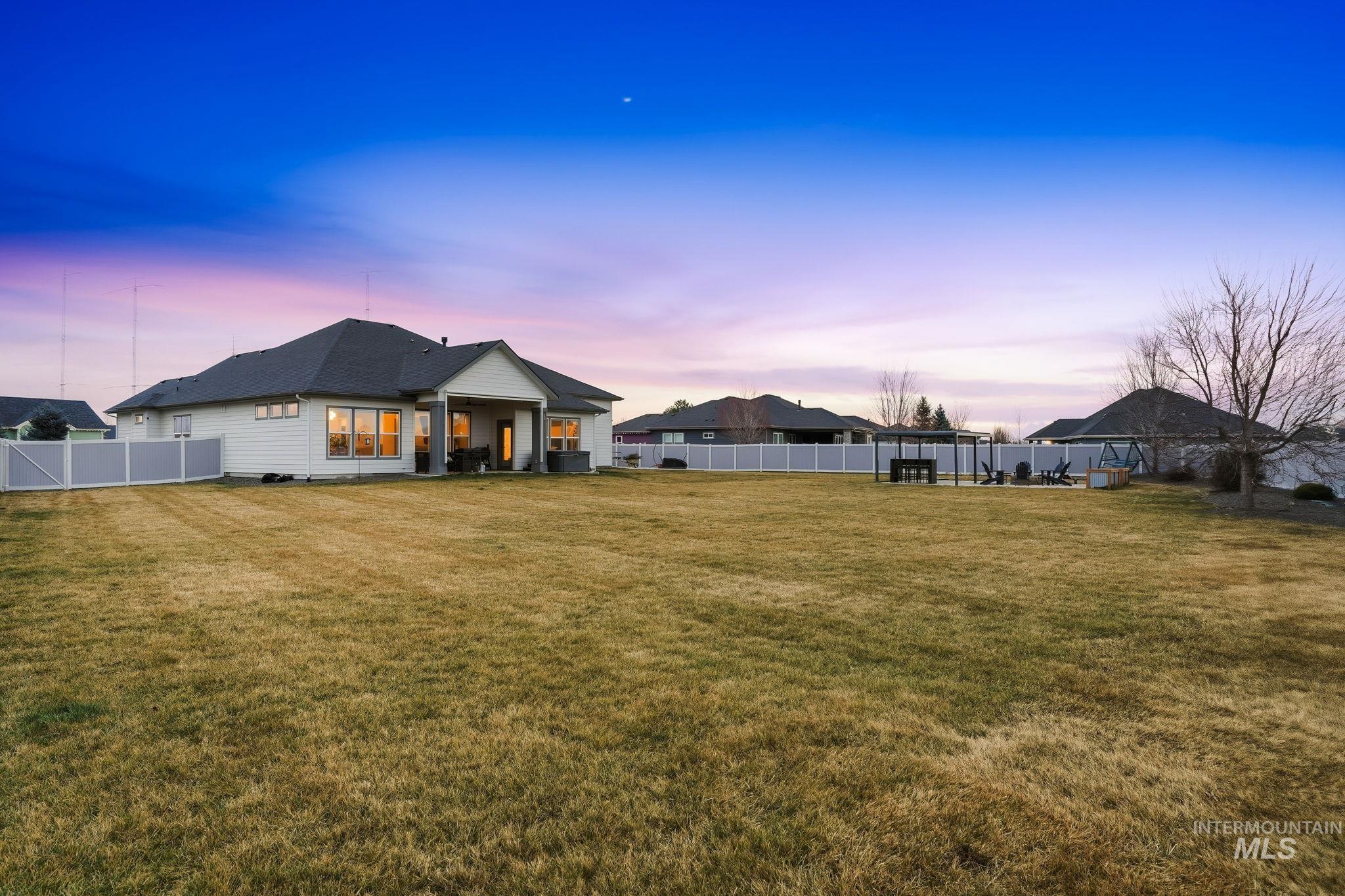 2301 Nordic Avenue Middleton, ID 83644 - Photo 46 of 50 Back of house featuring a fenced backyard and a patio