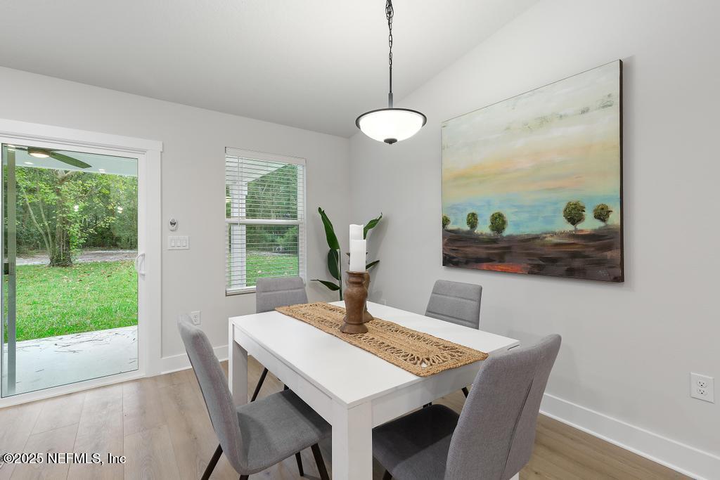 5124 Parete Road South Jacksonville, FL 32218 - Photo 21 of 42 a view of a dining room with furniture window and outside view