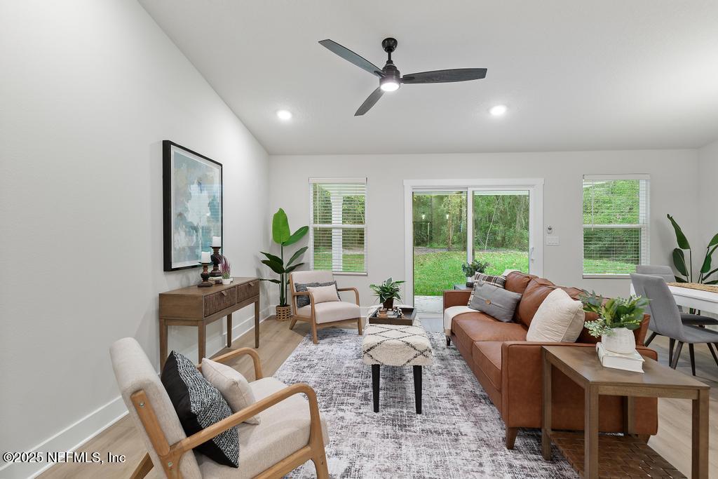 5124 Parete Road South Jacksonville, FL 32218 - Photo 27 of 42 a living room with furniture and a large window