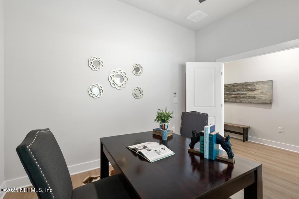 5124 Parete Road South Jacksonville, FL 32218 - Photo 10 of 42 a view of a workspace with furniture