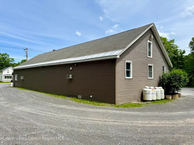 a front view of a house with a garage