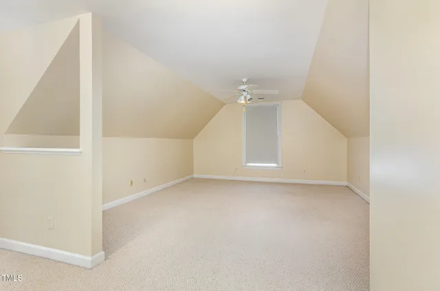 a utility room with cabinets dryer and washer