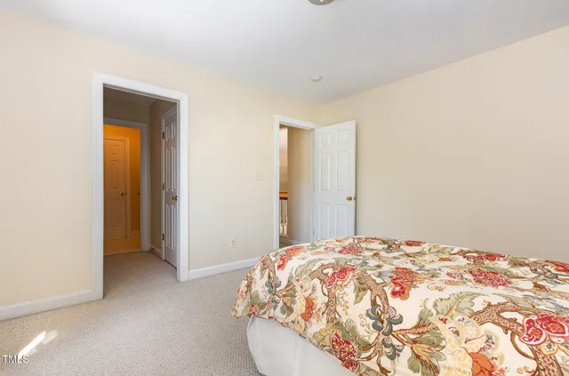 a view of a house with backyard and deck