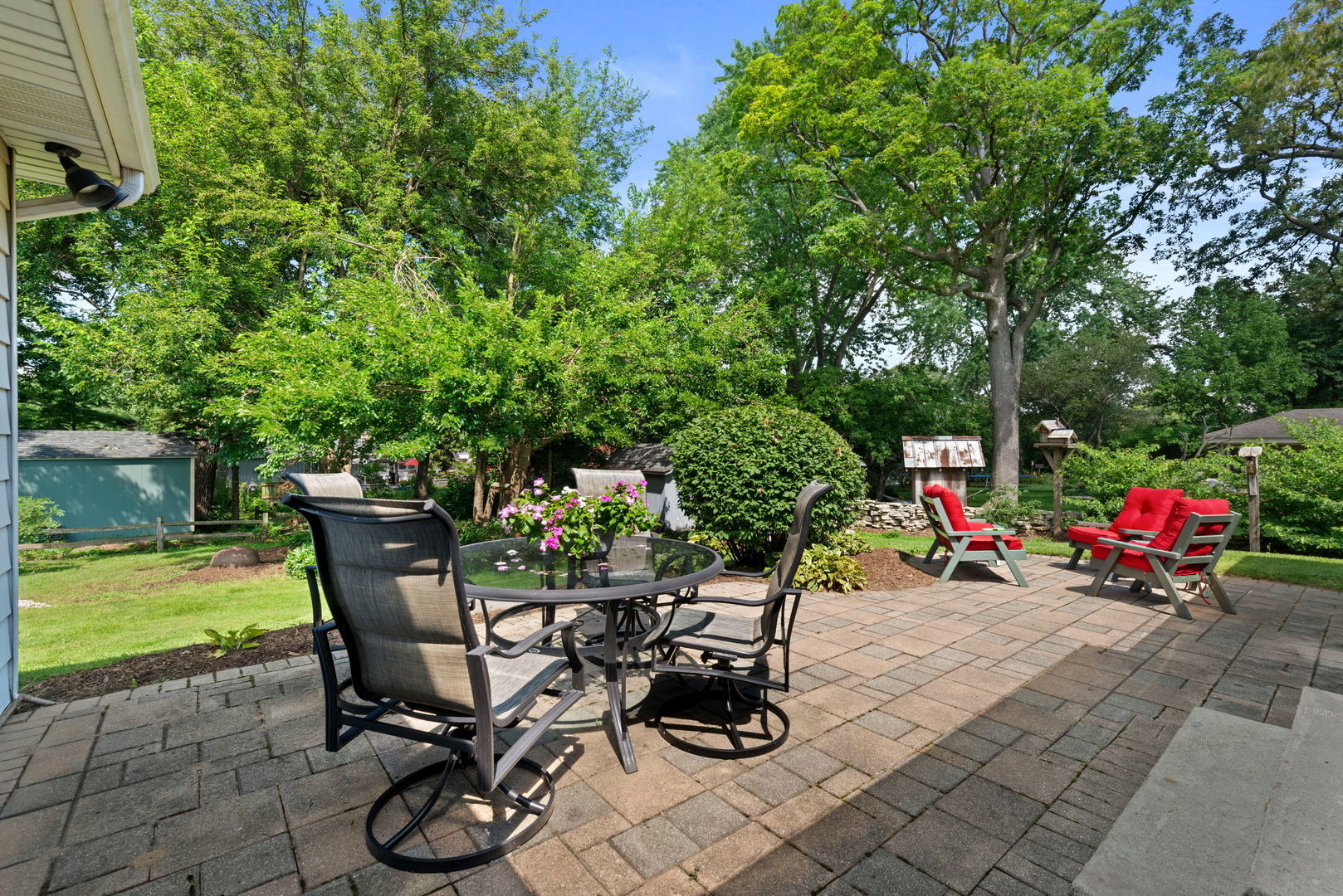 43W836 Hughes Road Elburn, IL 60119 - Photo 15 of 17 a view of a chairs and table in backyard