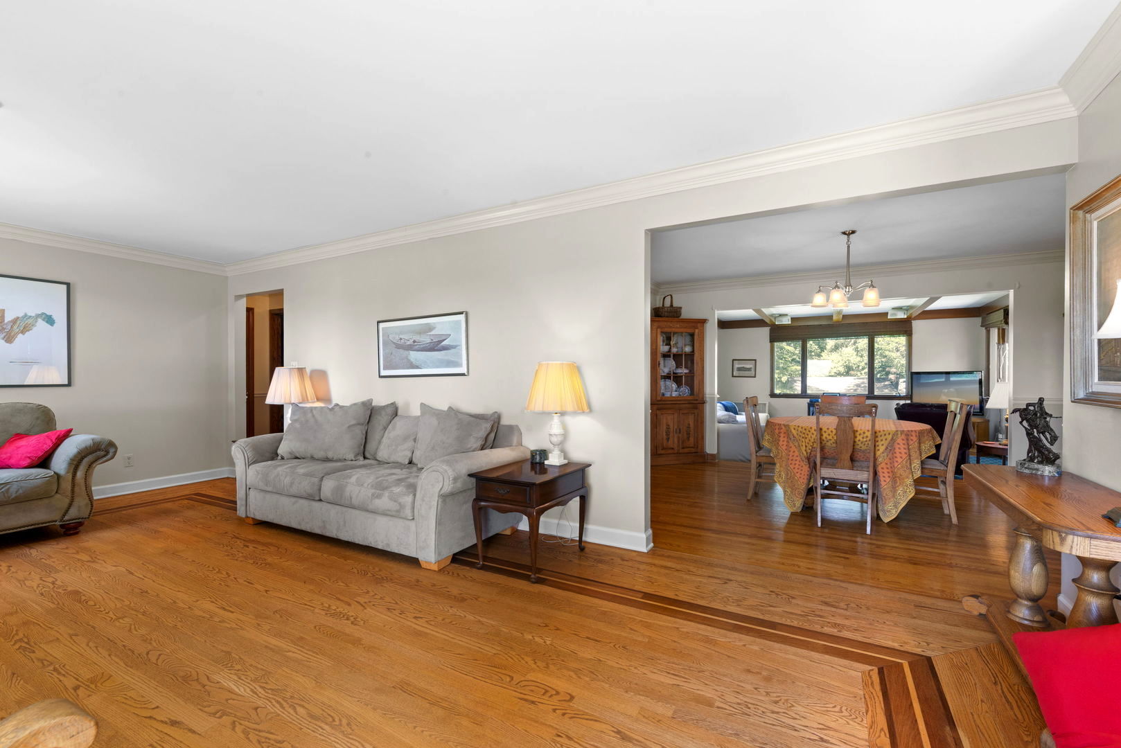 43W836 Hughes Road Elburn, IL 60119 - Photo 3 of 17 a living room with furniture and a chandelier
