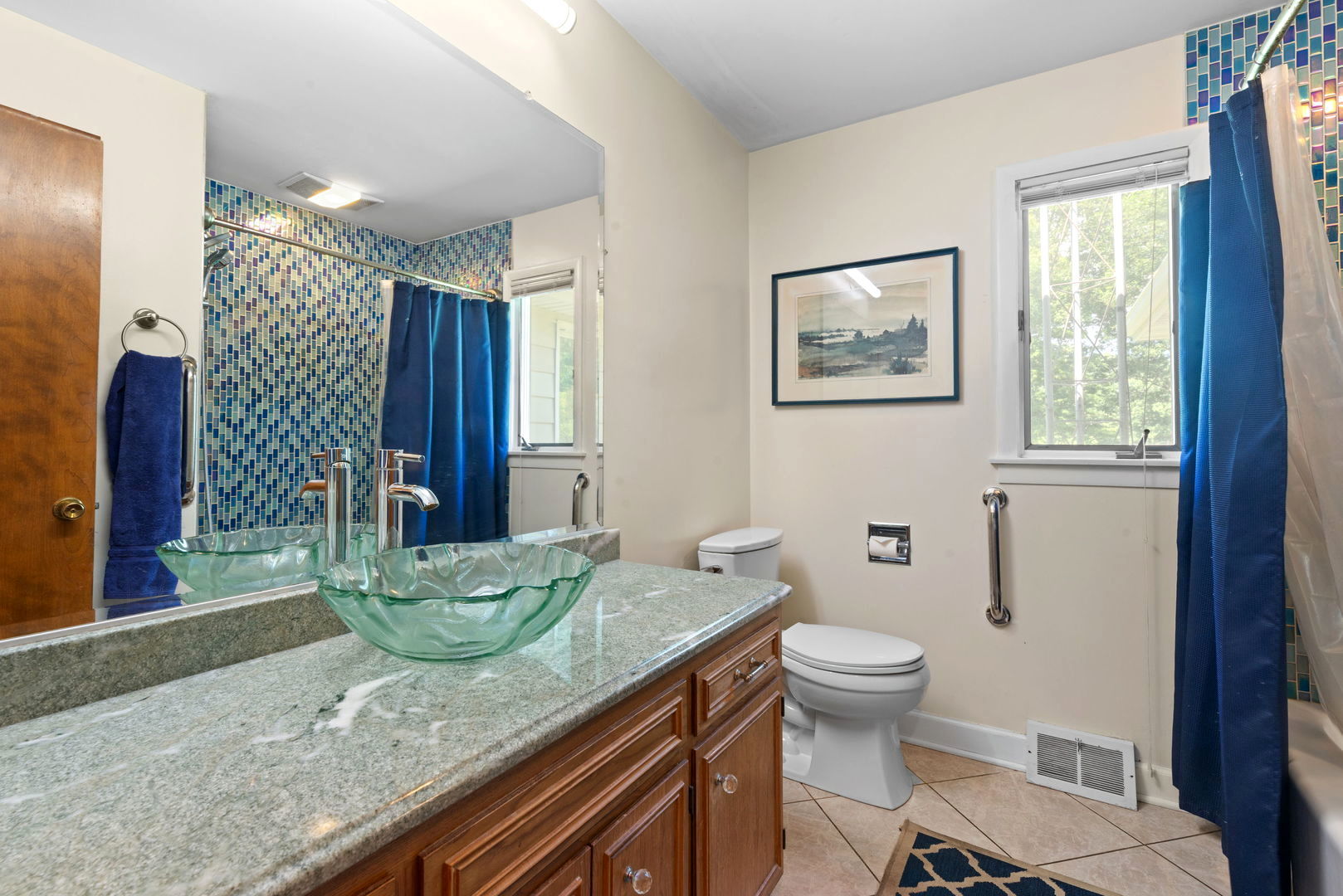 43W836 Hughes Road Elburn, IL 60119 - Photo 8 of 17 a spacious bathroom with a granite countertop toilet a sink and a mirror