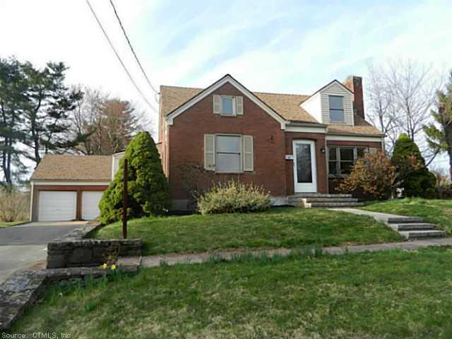 34 Timber Hill Road Cromwell, CT 06416 - Photo 1 of 1 a front view of a house with a yard