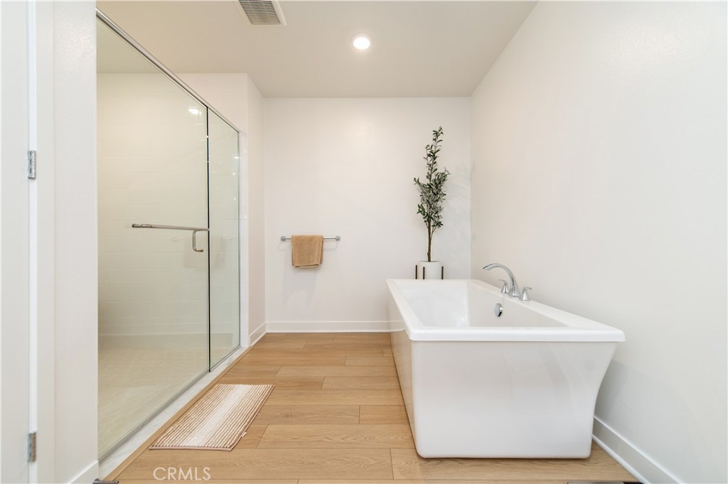 1209 Rivington Irvine, CA 92612 - Photo 15 of 38 a bathroom with a sink and a mirror