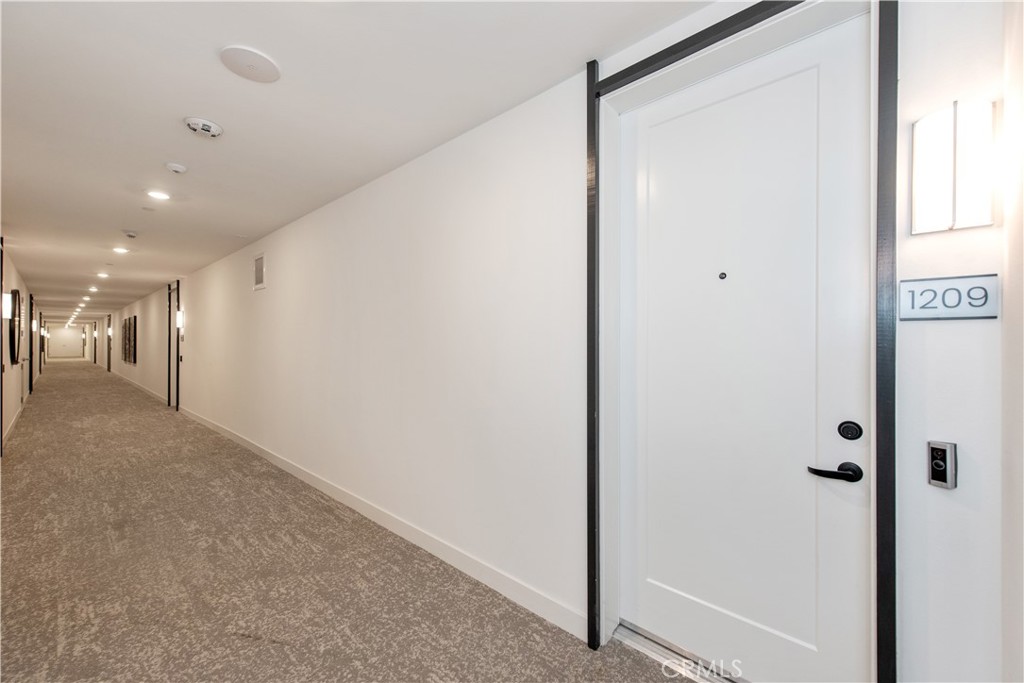 1209 Rivington Irvine, CA 92612 - Photo 23 of 38 a view of hallway with a large window