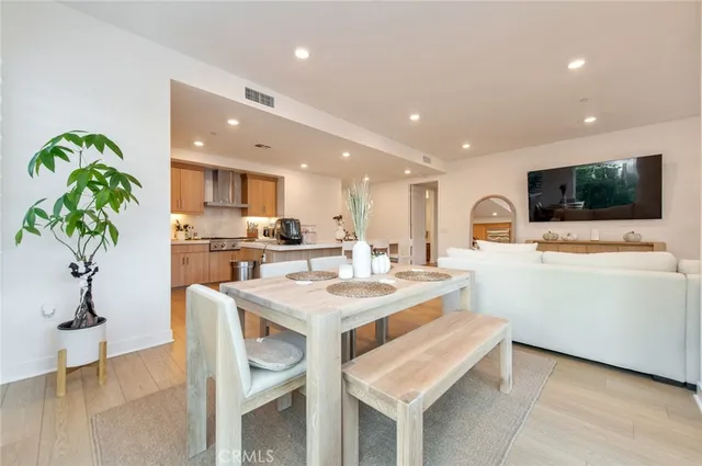 a kitchen with appliances and cabinets
