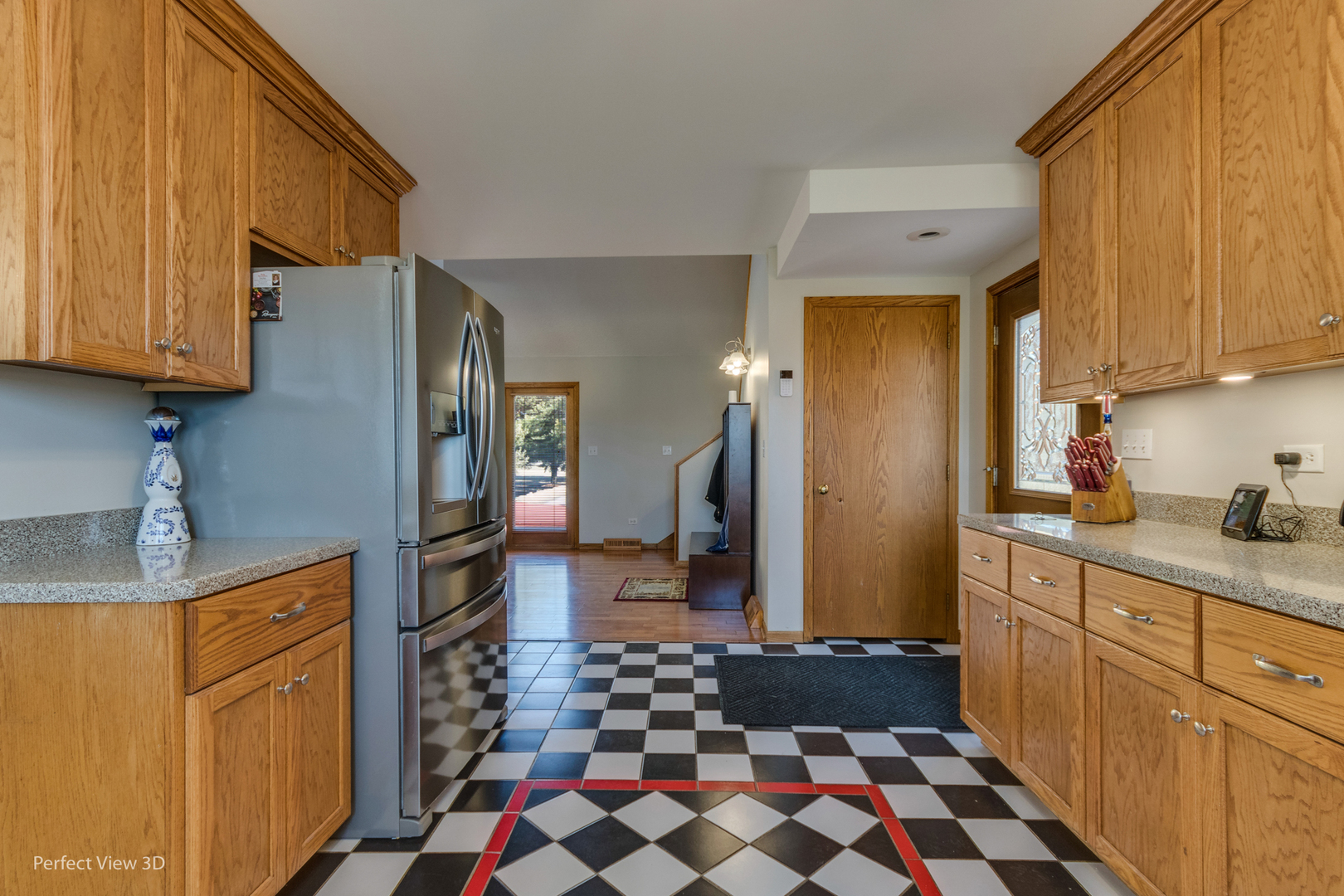 25255 South Tehle Road Elwood, IL 60421 - Photo 18 of 31 a kitchen with a sink a refrigerator and cabinets