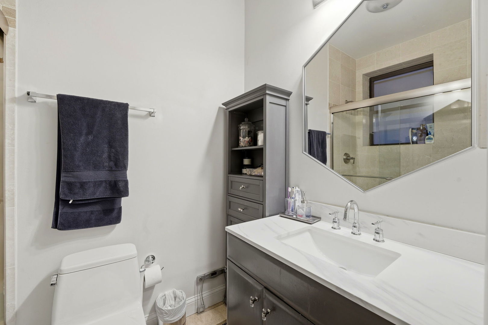 2142 North Racine Avenue, Unit 1 Chicago, IL 60614 - Photo 14 of 30 a bathroom with a sink toilet and shower
