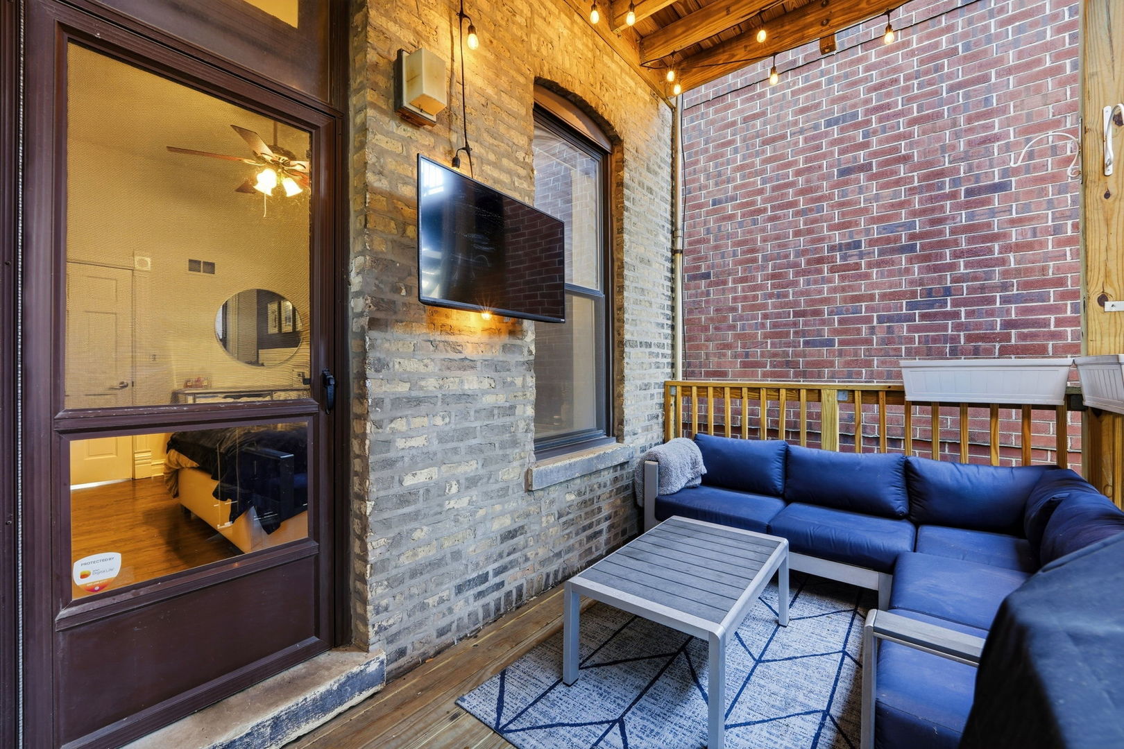 2142 North Racine Avenue, Unit 1 Chicago, IL 60614 - Photo 19 of 30 a balcony view with a couch