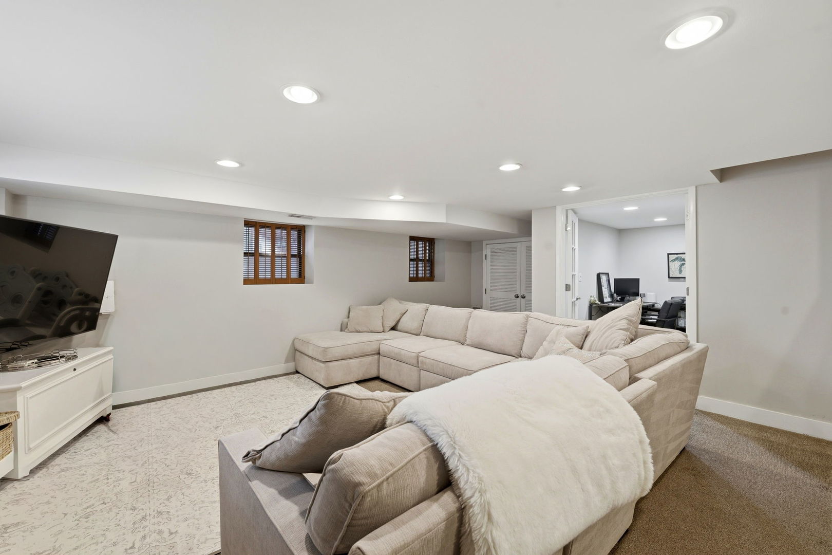 2142 North Racine Avenue, Unit 1 Chicago, IL 60614 - Photo 20 of 30 a living room with furniture and a flat screen tv