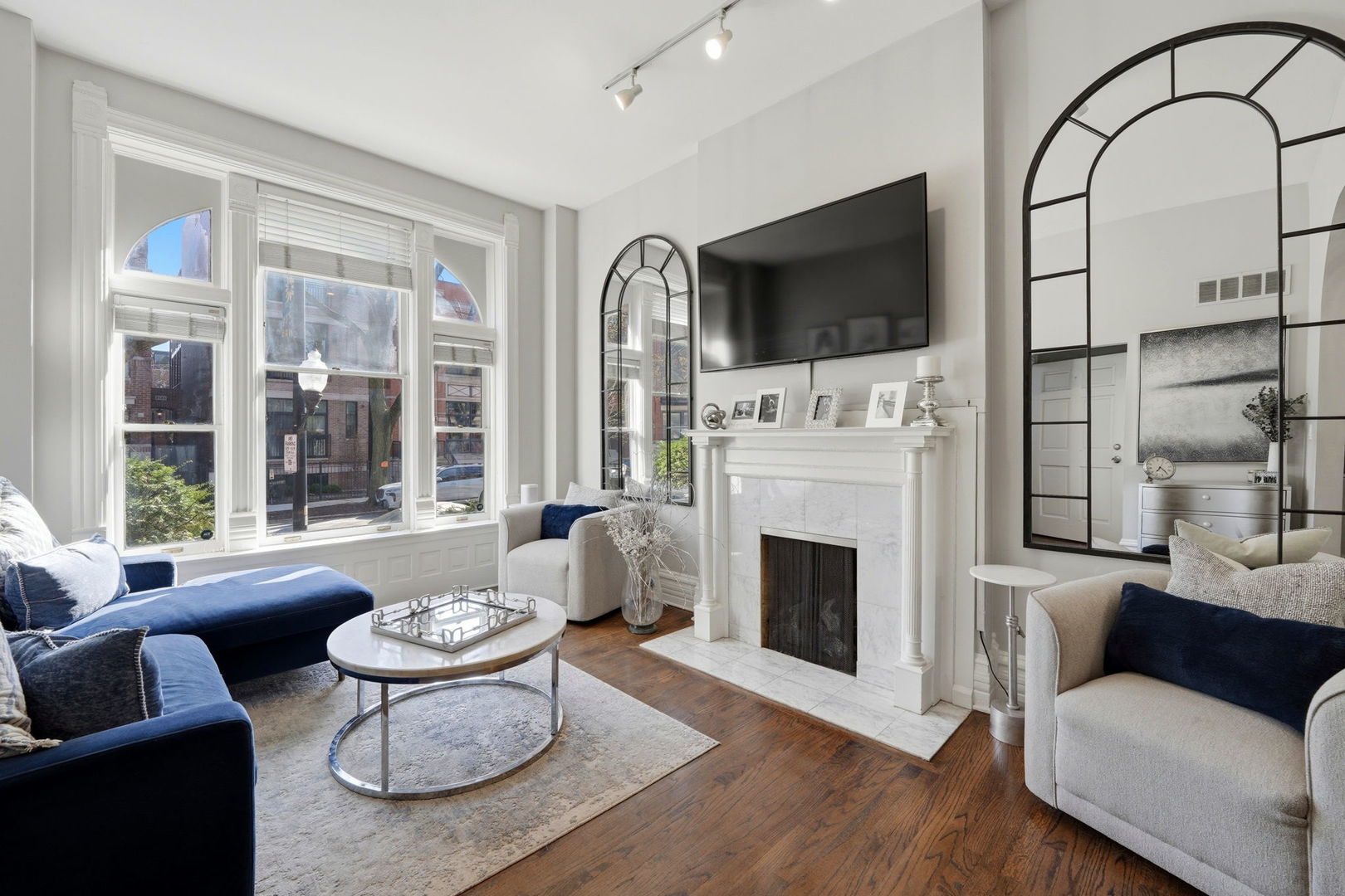 2142 North Racine Avenue, Unit 1 Chicago, IL 60614 - Photo 2 of 30 a living room with furniture fireplace and flat screen tv