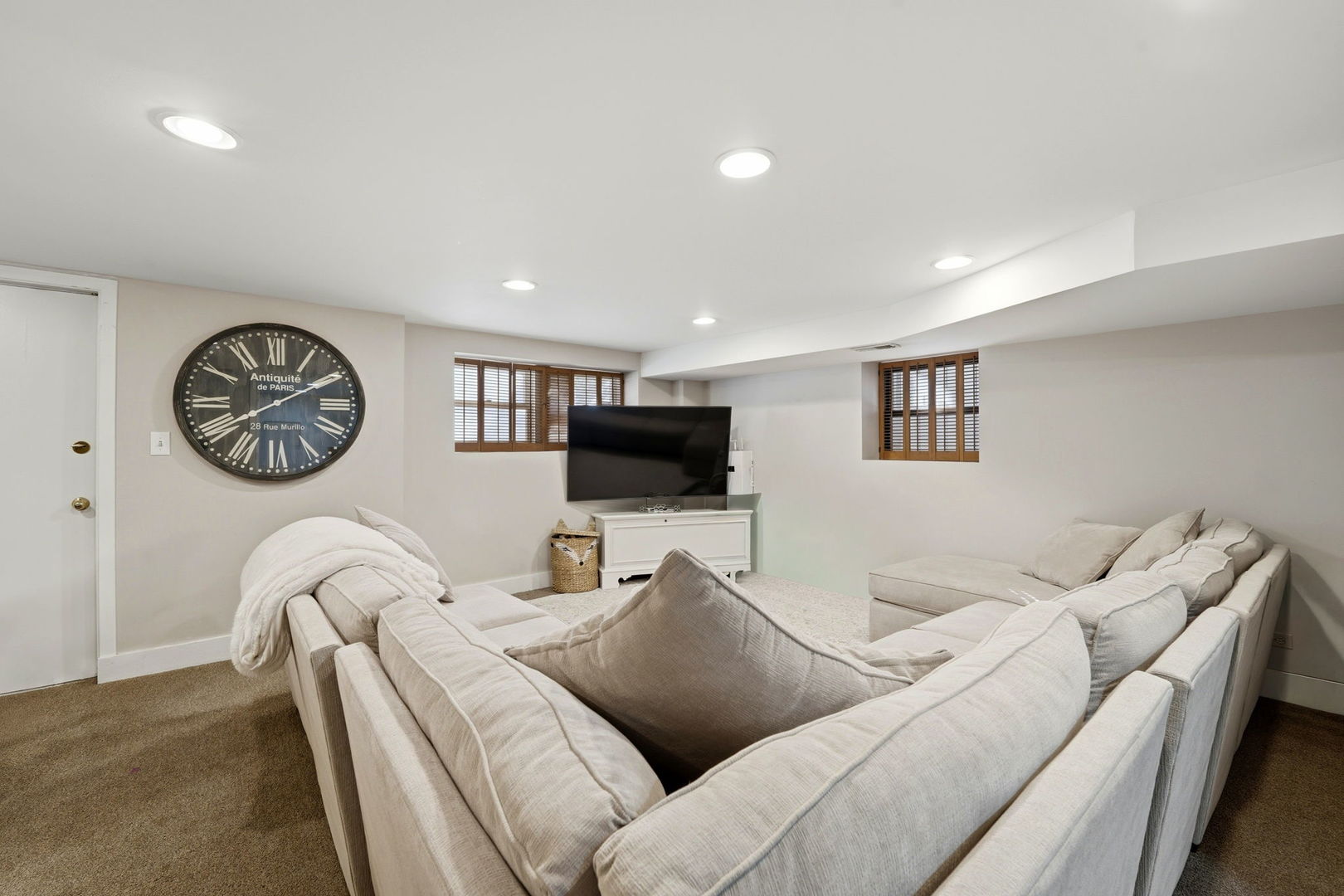 2142 North Racine Avenue, Unit 1 Chicago, IL 60614 - Photo 21 of 30 a living room with furniture and a flat screen tv