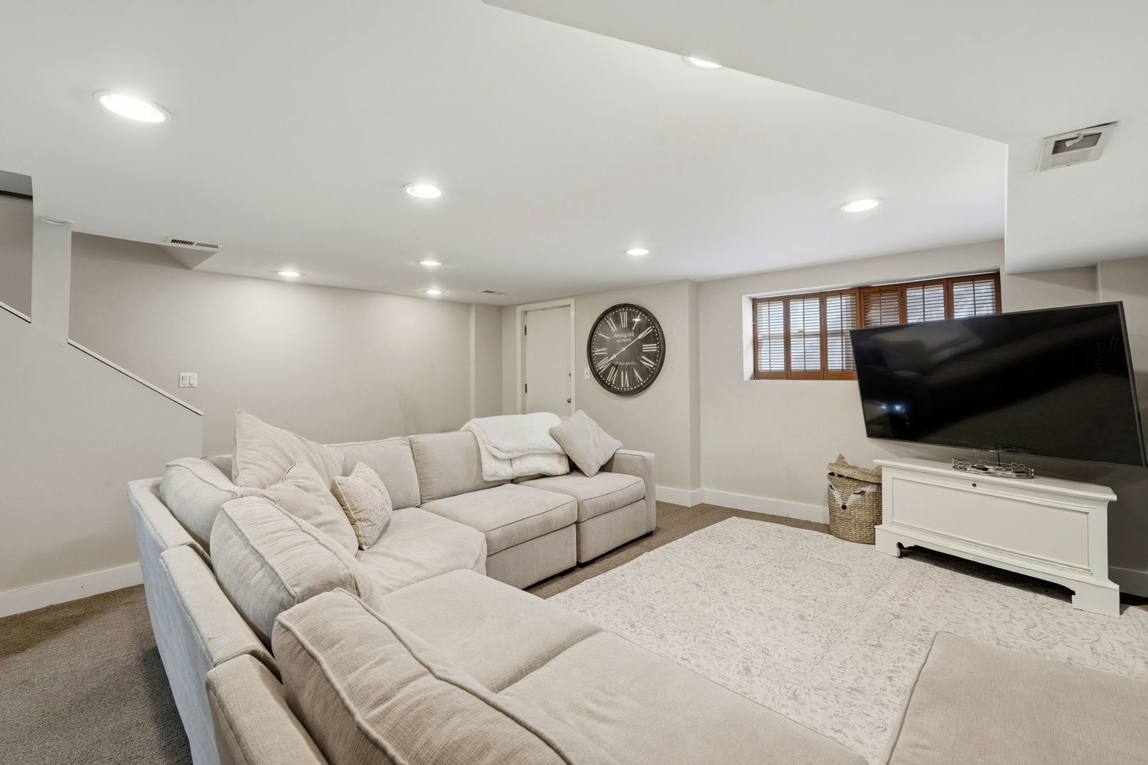 2142 North Racine Avenue, Unit 1 Chicago, IL 60614 - Photo 22 of 30 a living room with furniture and a flat screen tv
