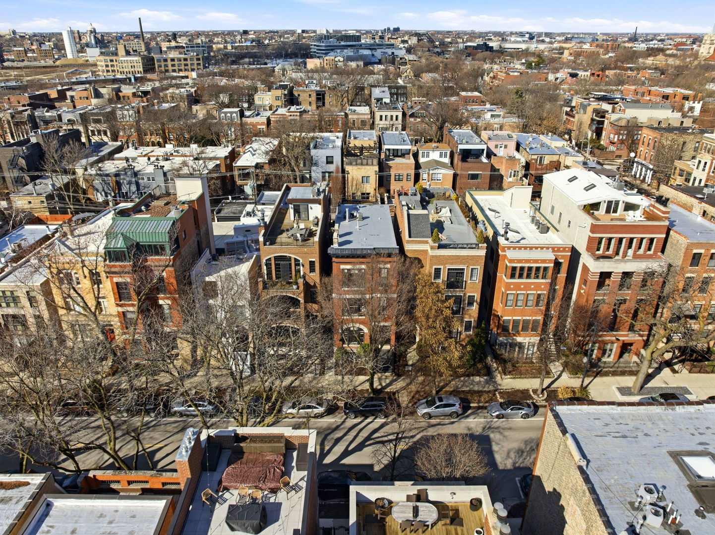 2142 North Racine Avenue, Unit 1 Chicago, IL 60614 - Photo 29 of 30 an aerial view of a residential apartment building with a yard