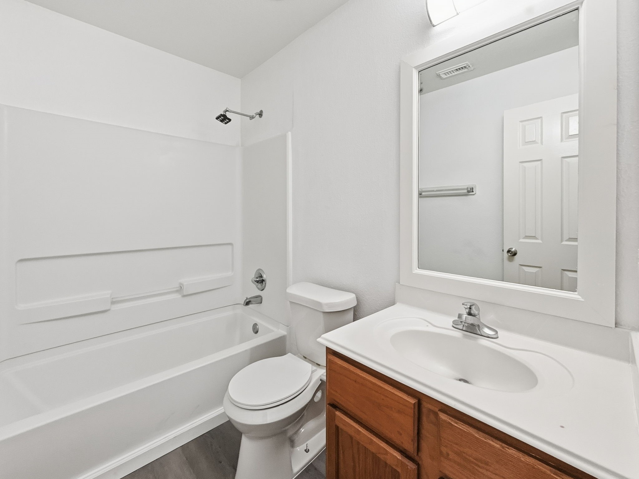 4907 Fox Mill Lane Spring, TX 77389 - Photo 14 of 18 a bathroom with a sink a toilet and shower
