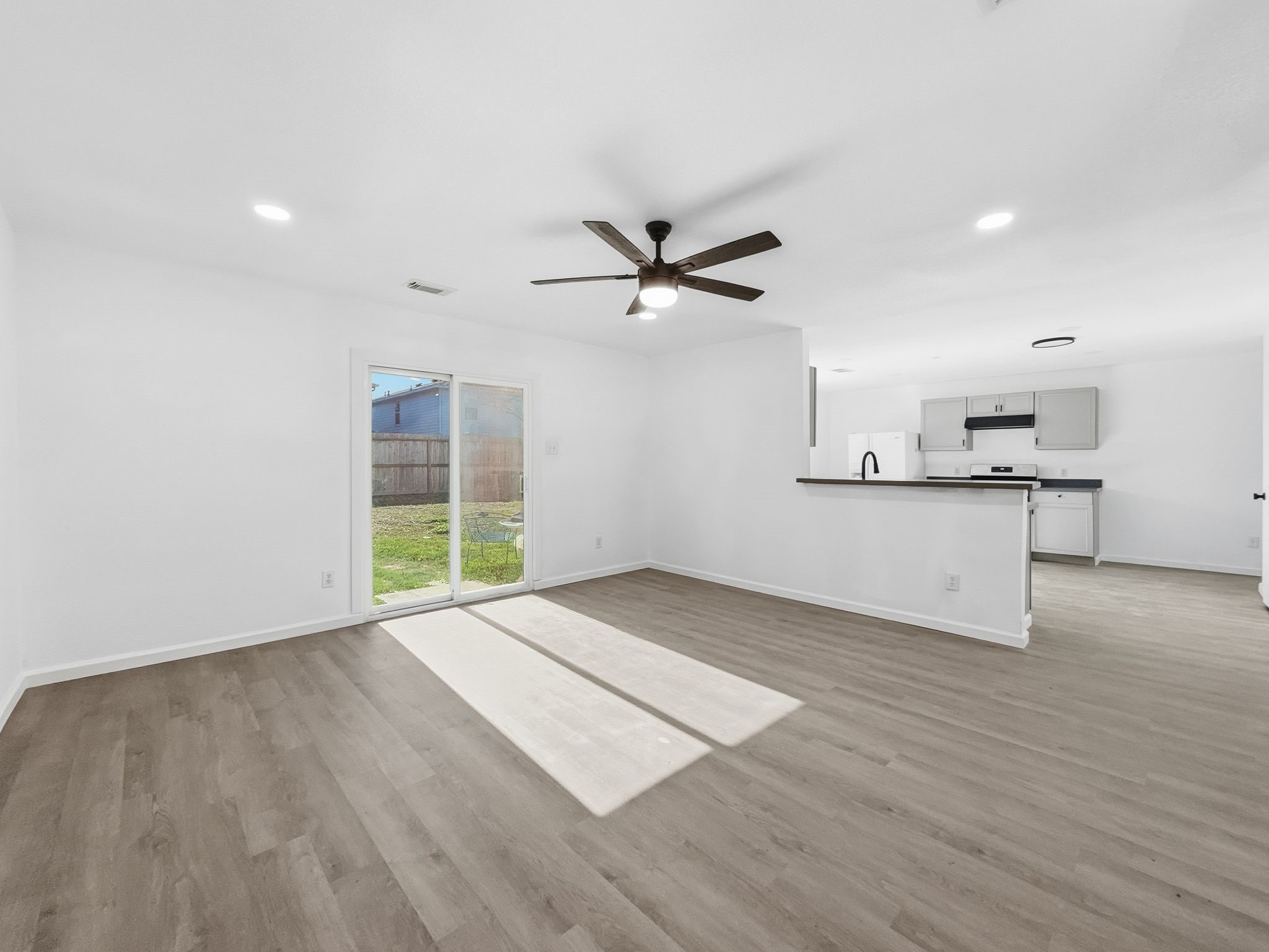 4907 Fox Mill Lane Spring, TX 77389 - Photo 5 of 18 a view of a kitchen with a sink and a window