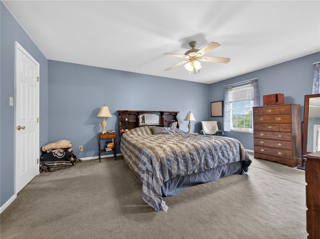 853 Lahr Road Nazareth, PA 18064 - Photo 15 of 29 Plush carpeting and a multi-speed ceiling fan complete this comfortable, airy sleeping space.