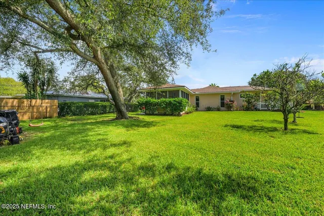 a view of a garden with trees