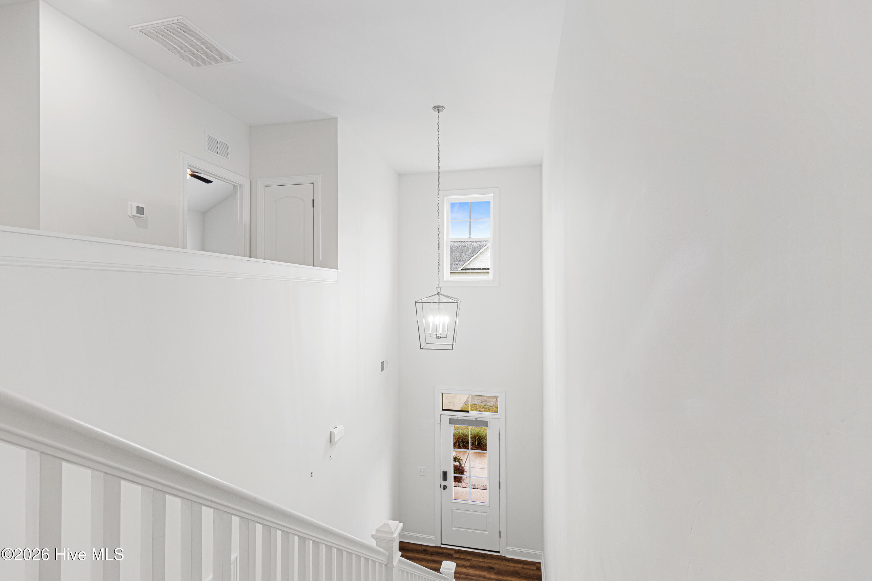 140 Freedom Park Road Beaufort, NC 28516 - Photo 17 of 54 Staircase Overlooking Entry & Yard