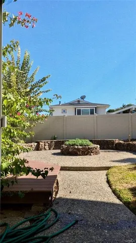 a view of a yard with an outdoor space