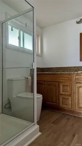 a bathroom with a bathtub and shower
