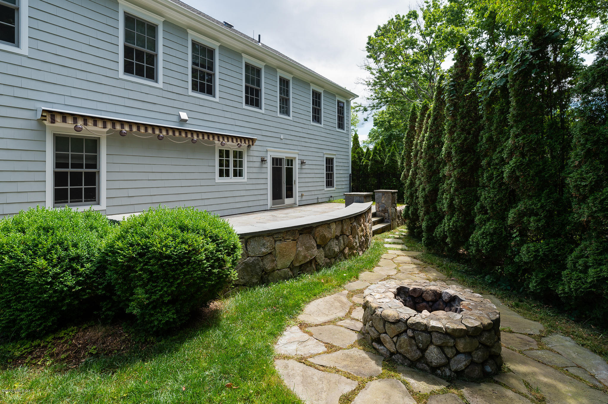 15 Old Orchard Road Riverside, CT 06878 - Photo 24 of 26 a front view of a house with a yard