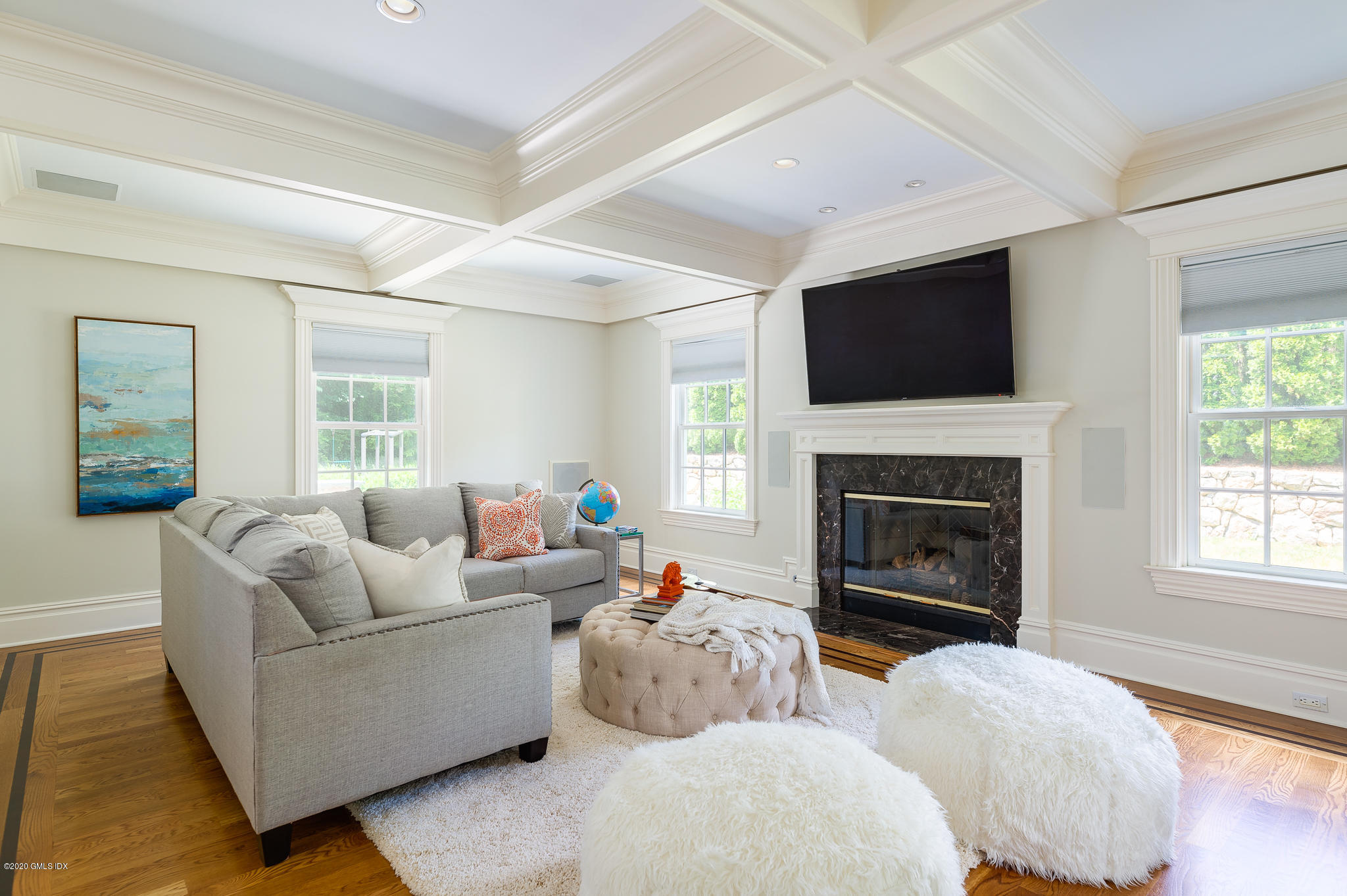 15 Old Orchard Road Riverside, CT 06878 - Photo 5 of 26 a living room with furniture a fireplace and a flat screen tv