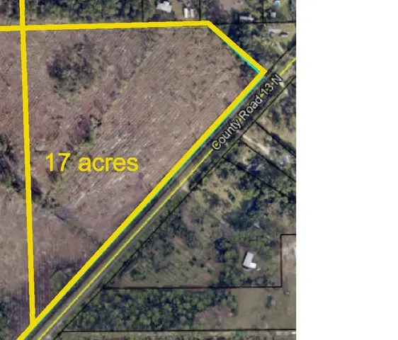 a view of a swimming pool with an outdoor seating