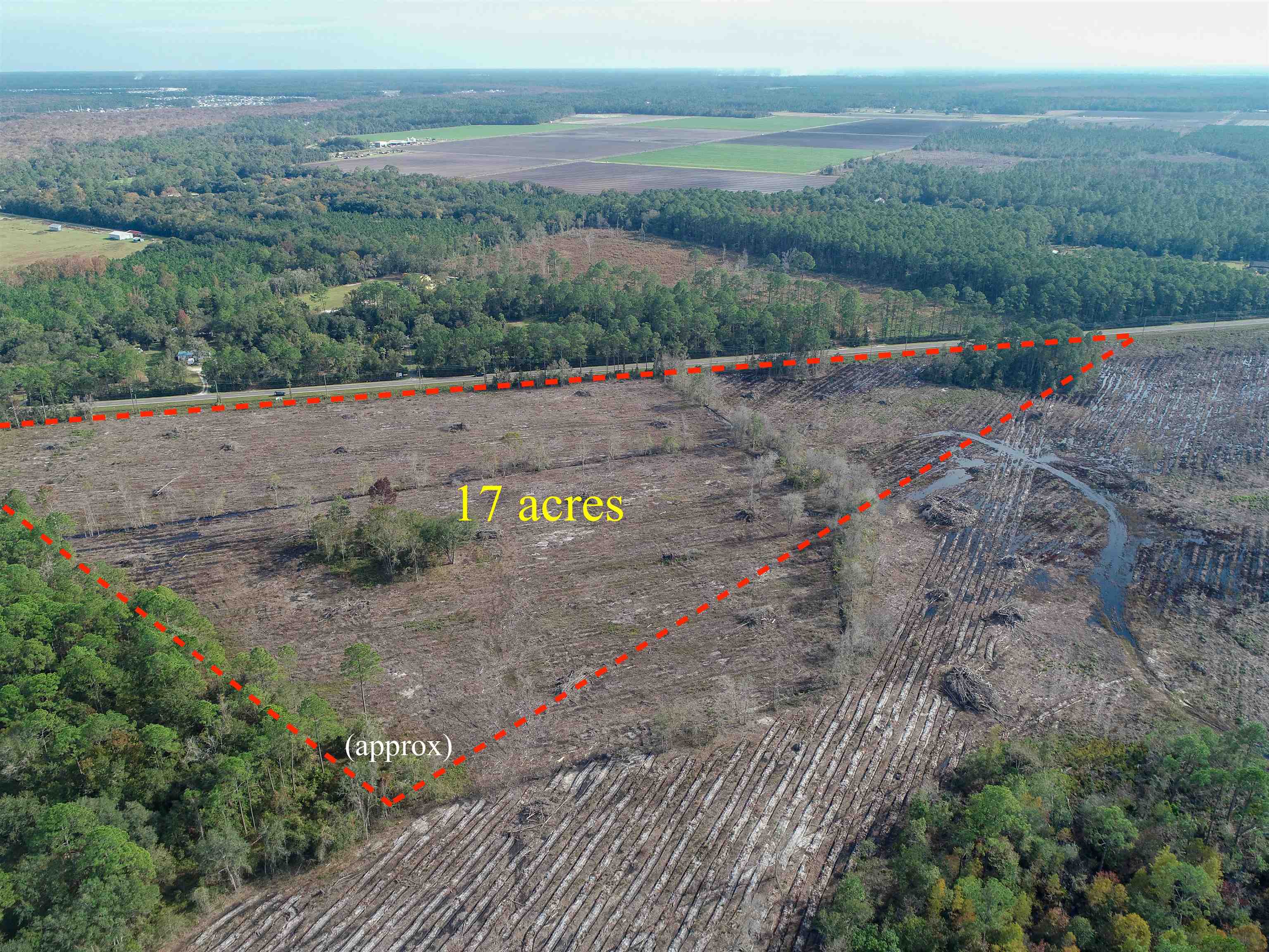 0 County Road 13 South St. Augustine, FL 32092 - Photo 6 of 12 an aerial view of a house with a yard