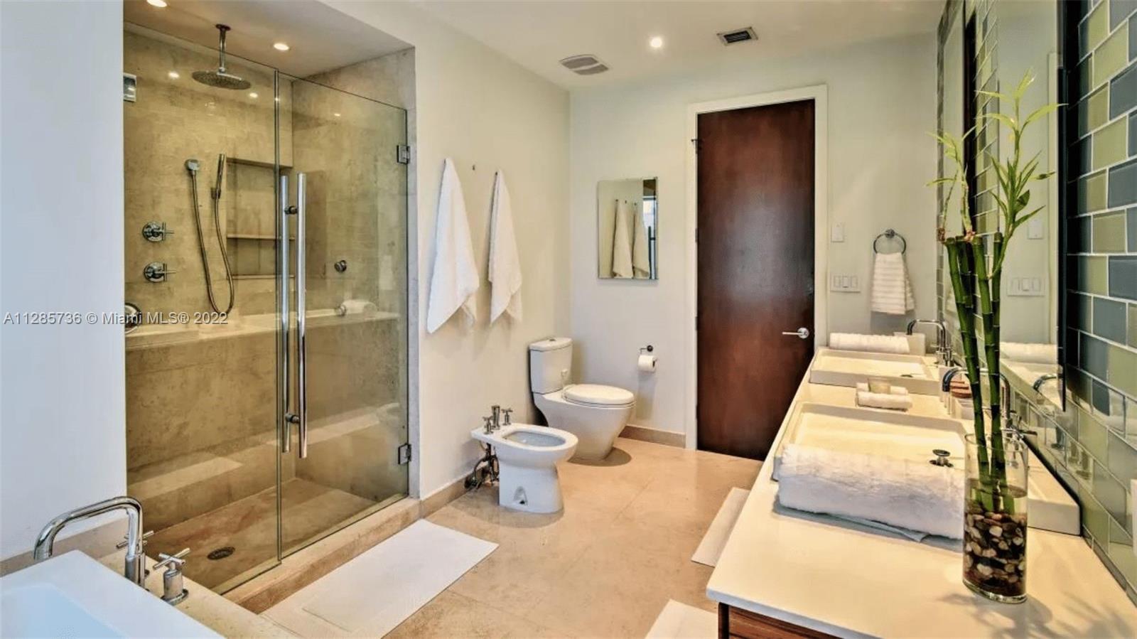 Keystone Point North Miami, FL 33181 - Photo 20 of 26 a spacious bathroom with a shower and a toilet