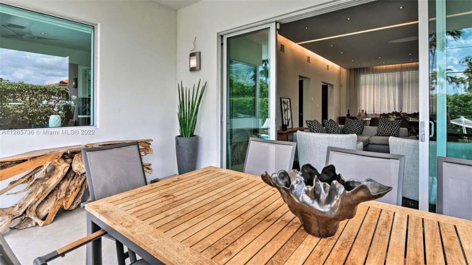Keystone Point North Miami, FL 33181 - Photo 23 of 26 a view of a dining room with furniture window and outside view