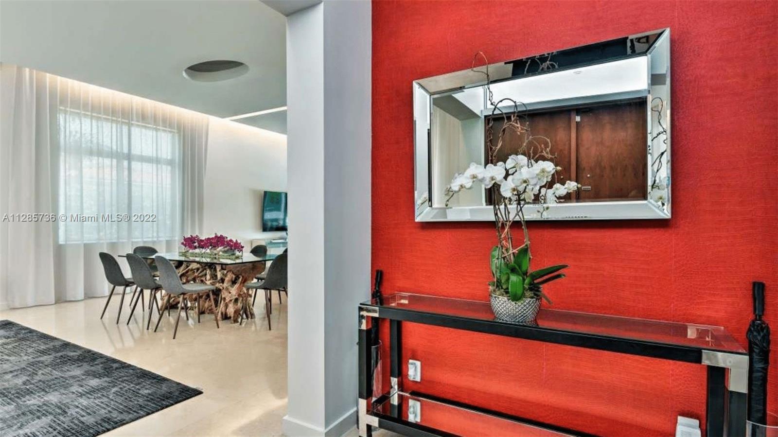 Keystone Point North Miami, FL 33181 - Photo 3 of 26 a view of a dining room with furniture and a potted plant