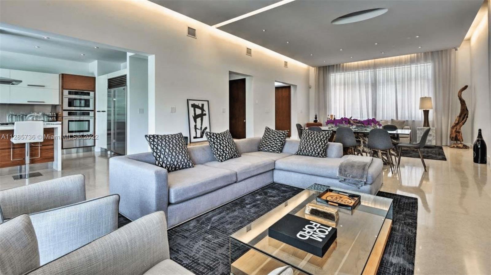 Keystone Point North Miami, FL 33181 - Photo 6 of 26 a living room with furniture and a large window