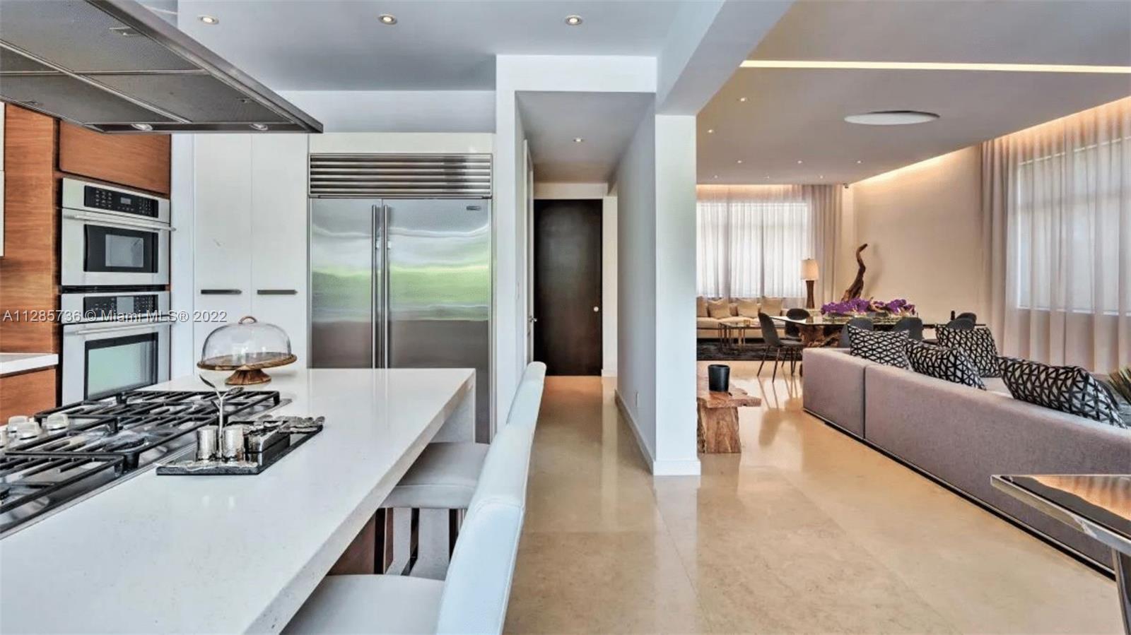 Keystone Point North Miami, FL 33181 - Photo 9 of 26 a large living room with stainless steel appliances furniture