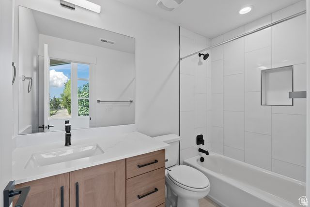 545 East 7215 South Midvale, UT 84047 - Photo 23 of 27 Bathroom with vanity and shower combination