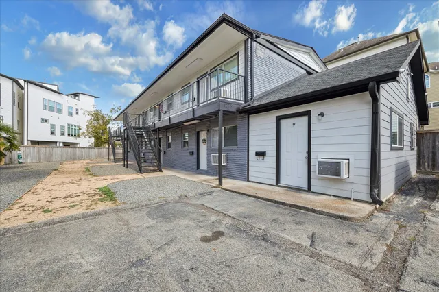 a view of a house with a large space
