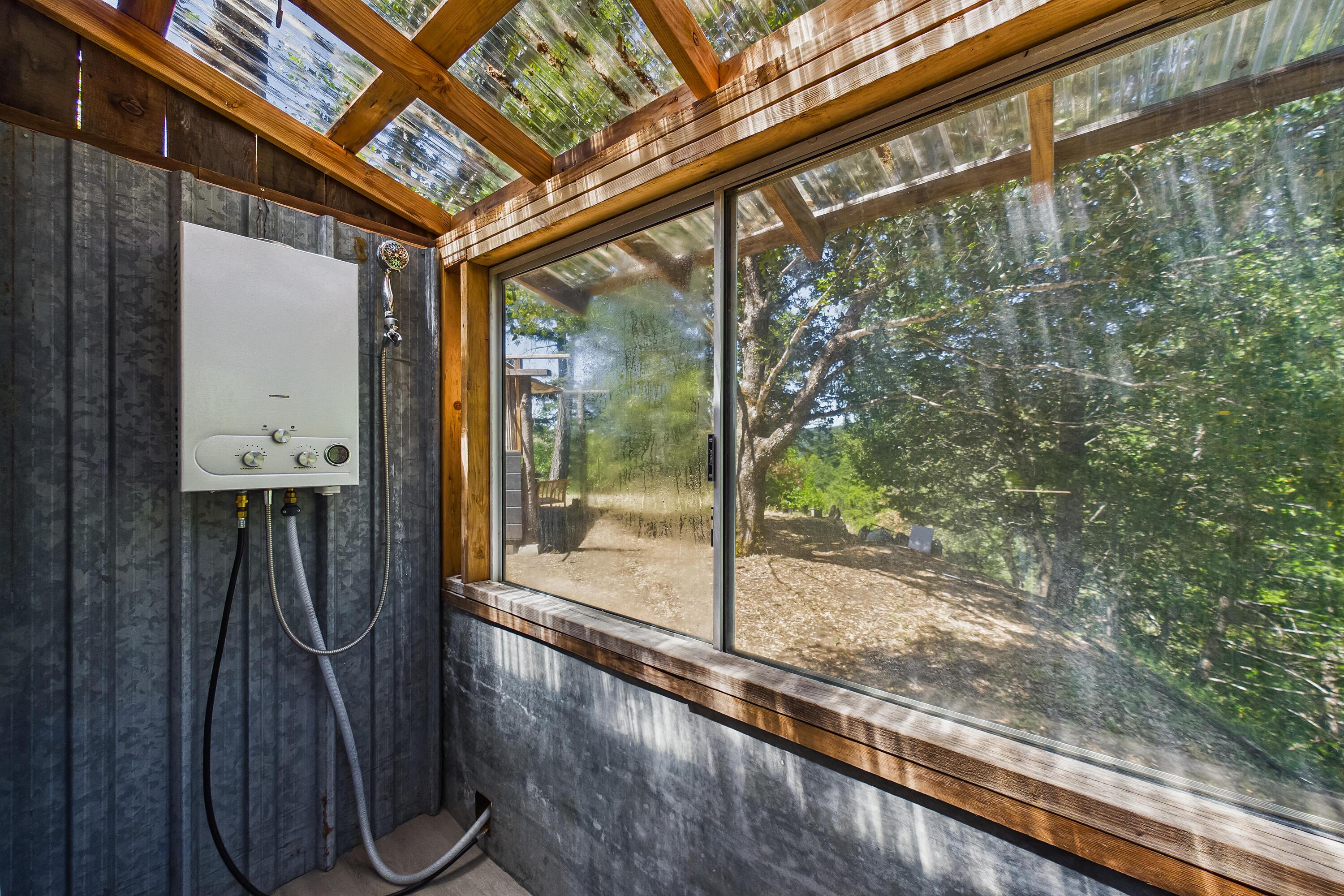 60890 Bell Springs Road Laytonville, CA 95454 - Photo 32 of 77 a view of a room with wooden floor and a porch