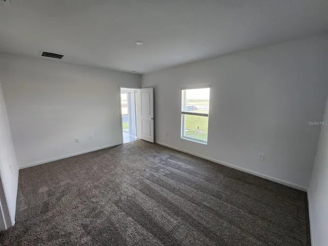 a view of empty room with window
