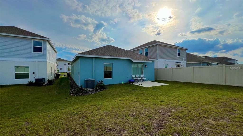 2713 Runners Circle Clermont, FL 34714 - Photo 30 of 30 a view of a house with a yard and sitting area