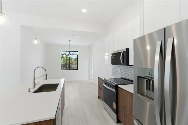 an empty room that has a window in it