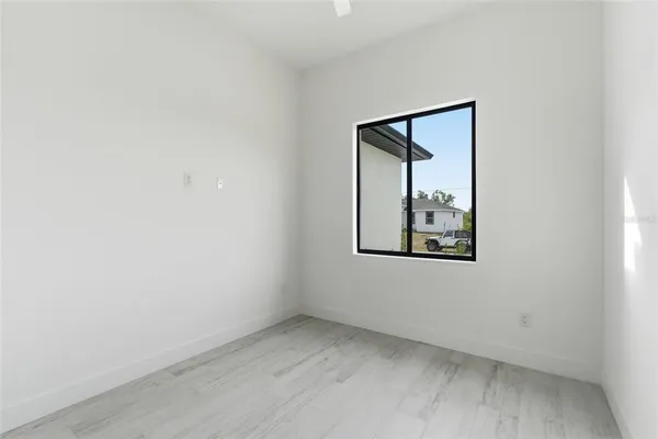 a view of an empty room with a sliding door