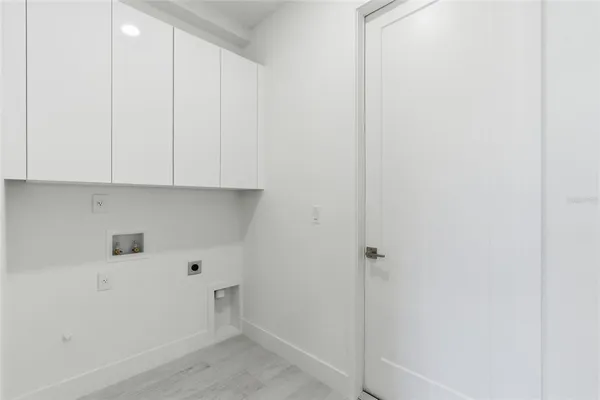 an aerial view of a house with a swimming pool