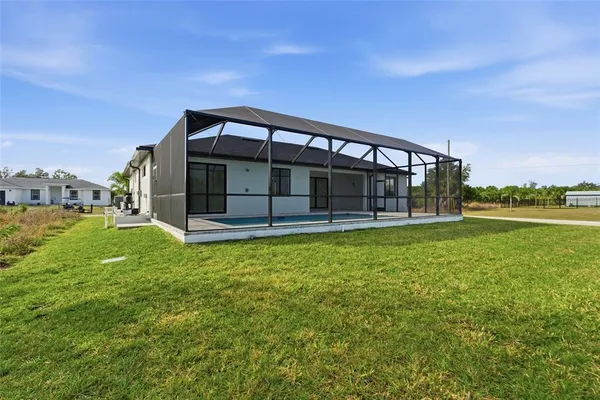 an aerial view of a house with a garden