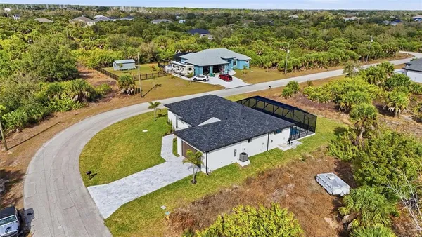 an aerial view of residential building with outdoor space