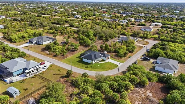 an aerial view of residential building and lake view